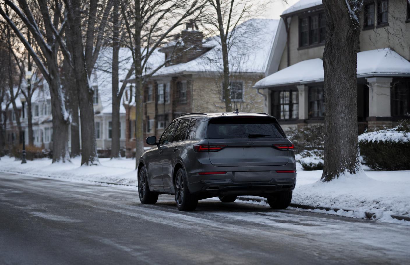 An unmarked delivery vehicle parked on a quiet Twin Cities residential street